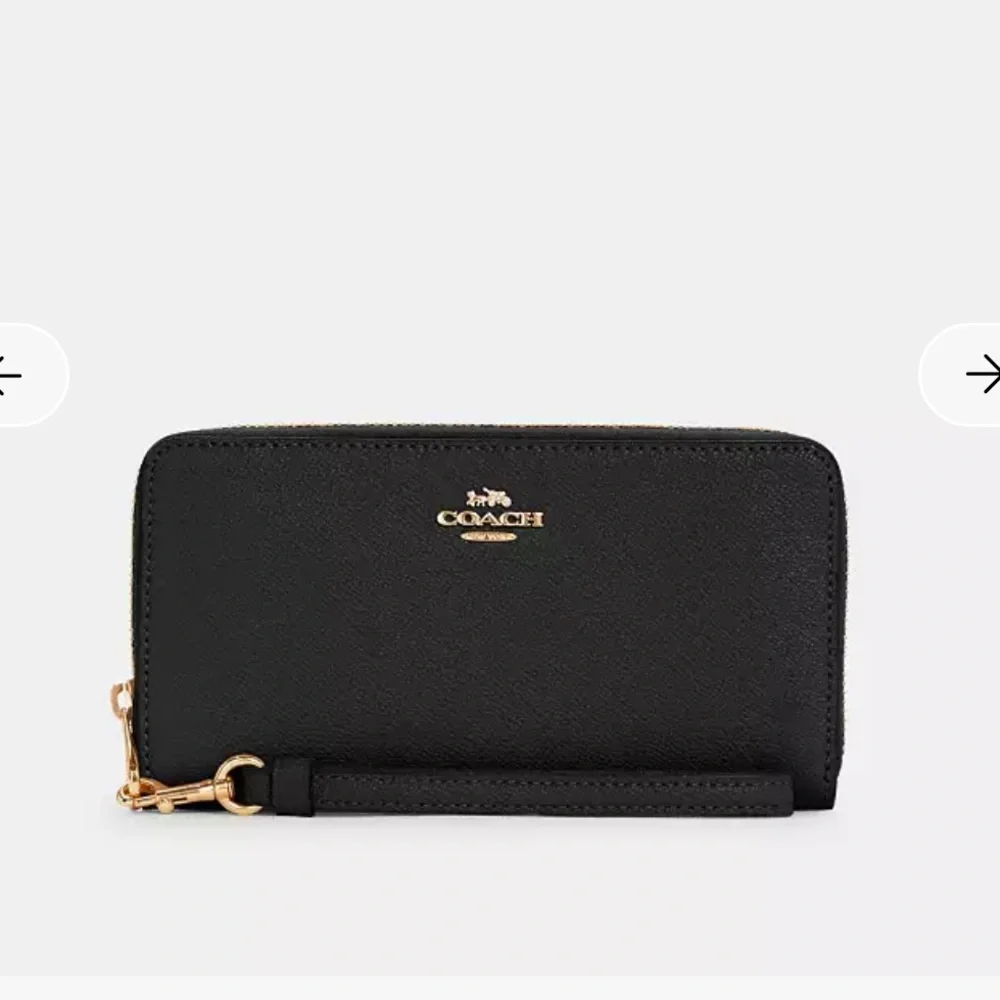 Coach wristlet zip around black pebble wallet